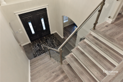 modern staircase with glass railing