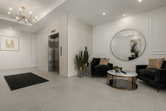 Modern Lobby with Stylish Seating and Elevator