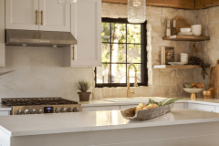 Lakeshore Lakehouse Design -  Kitchen Island with custom Stools