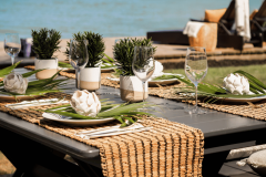 Lakeshore Lakehouse Design - Dining Table on the Outdoor Patio